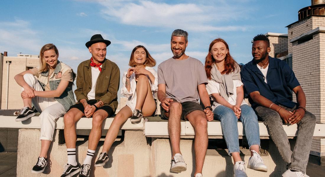 Students laughing on a rooftoop